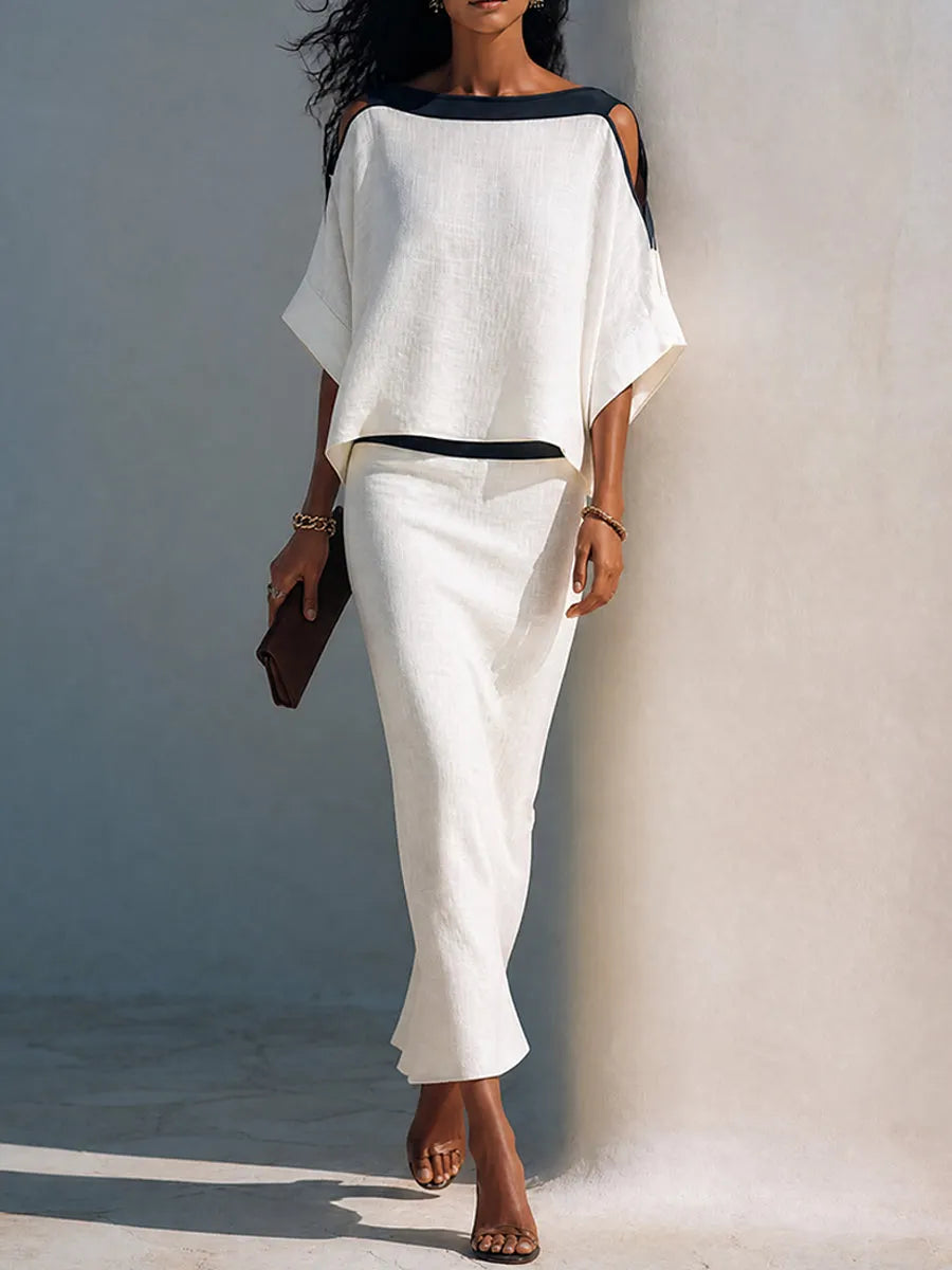 GEMMA - Conjunto blanco cut-out con top y falda murciélago